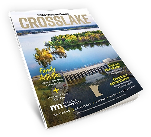 Copy of the 2023 Brainerd Lakes Visitor Guide magazine showing an aerial photo of Cross Lake during sunset on a summer day 500PX Wide